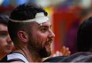 12 January 2019; Daniel O'Sullivan of Tradehouse Central Ballincollig watching from the bench after sustaining a facial injury during the Hula Hoops Presidents National Cup semi-final match between Tradehouse Central Ballincollig and Limerick Celtics at Neptune Stadium in Cork.  Photo by Eóin Noonan/Sportsfile