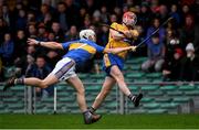 13 January 2019; Niall Deasy of Clare in action against Joe O'Dwyer of Tipperary during the Co-Op Superstores Munster Hurling League Final 2019 match between Clare and Tipperary at the Gaelic Grounds in Limerick. Photo by Piaras Ó Mídheach/Sportsfile