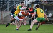 13 January 2019; Jemar Hall of Armagh in action against Martin McElhinney and Hugh McFadden of Donegal during the Bank of Ireland Dr McKenna Cup semi-final match between Donegal and Armagh at Healy Park in Tyrone. Photo by Oliver McVeigh/Sportsfile