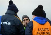 13 January 2019; Roscommon manager Anthony Cunningham speaks to members of his backroom team following the Connacht FBD League semi-final match between Roscommon and Sligo at Dr. Hyde Park in Roscommon. Photo by David Fitzgerald/Sportsfile