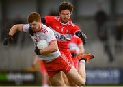 13 January 2019; Cathal McShane of Tyrone in action against Christopher McKaigue of Derry during the Bank of Ireland Dr McKenna Cup semi-final match between Tyrone and Derry at the Athletic Grounds in Armagh. Photo by Sam Barnes/Sportsfile