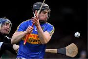 13 January 2019; Dan McCormack of Tipperary scores his side's first goal despite the efforts of Clare goalkeeper Donal Tuohy during the Co-Op Superstores Munster Hurling League Final 2019 match between Clare and Tipperary at the Gaelic Grounds in Limerick. Photo by Piaras Ó Mídheach/Sportsfile