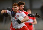 13 January 2019; Cathal McShane of Tyrone in action against Christopher McKaigue of Derry during the Bank of Ireland Dr McKenna Cup semi-final match between Tyrone and Derry at the Athletic Grounds in Armagh. Photo by Sam Barnes/Sportsfile