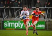 13 January 2019; Darragh Canavan of Tyrone in action against Eoghan Concannon of Derry during the Bank of Ireland Dr McKenna Cup semi-final match between Tyrone and Derry at the Athletic Grounds in Armagh. Photo by Sam Barnes/Sportsfile