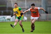 13 January 2019; Paul Brennan of Donegal in action against Niall Grimley of Armagh during the Bank of Ireland Dr McKenna Cup semi-final match between Donegal and Armagh at Healy Park in Tyrone. Photo by Oliver McVeigh/Sportsfile