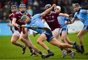 13 January 2019; Chris Crummey of Dublin is tackled by Cathal Mannion, left, and Kevin Hussey of Galway during the Bord na Mona Walsh Cup semi-final match between Dublin and Galway at Parnell Park in Dublin.  Photo by Ramsey Cardy/Sportsfile