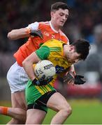 13 January 2019; Ryan McHugh of Donegal in action against Connaire Mackin of Armagh during the Bank of Ireland Dr McKenna Cup semi-final match between Donegal and Armagh at Healy Park in Tyrone. Photo by Oliver McVeigh/Sportsfile