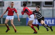 14 January 2019; Charlie Costello of Catholic University School is tackled by Ronan Lydon of Cistercian College Roscrea during the Bank of Ireland Fr. Godfrey Cup Round 1 match between Catholic University School and Cistercian College Roscrea at Energia Park in Dublin. Photo by Harry Murphy/Sportsfile