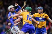13 January 2019; Patrick Maher of Tipperary in action against Clare players, from left, Conor Cleary, Michael O'Malley, and David McInerney during the Co-Op Superstores Munster Hurling League Final 2019 match between Clare and Tipperary at the Gaelic Grounds in Limerick. Photo by Piaras Ó Mídheach/Sportsfile