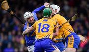 13 January 2019; Patrick Maher of Tipperary in action against Clare players, from left, Conor Cleary, Michael O'Malley, and David McInerney during the Co-Op Superstores Munster Hurling League Final 2019 match between Clare and Tipperary at the Gaelic Grounds in Limerick. Photo by Piaras Ó Mídheach/Sportsfile