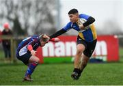 14 January 2019; Adel Mahmoud of CBS Naas is tackled by Jamie Keane of Salesian College during the Bank of Ireland Fr. Godfrey Cup Round 1 match between CBS Naas and Salesian College at Cill Dara RFC in Kildare. Photo by Eóin Noonan/Sportsfile