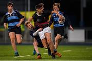 14 January 2019; Eli Breen of The High School attempts to offload whilst being tackled by Louis Perrem of Newpark Comprehensive School during the Bank of Ireland Fr. Godfrey Cup Round 1 match between The High School and Newpark Comprehensive at Energia Park in Dublin. Photo by Harry Murphy/Sportsfile