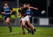 14 January 2019; Eli Breen of The High School attempts to offload whilst being tackled by Louis Perrem of Newpark Comprehensive School during the Bank of Ireland Fr. Godfrey Cup Round 1 match between The High School and Newpark Comprehensive at Energia Park in Dublin. Photo by Harry Murphy/Sportsfile