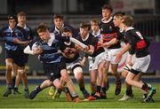 14 January 2019; Louis Perrem of Newpark Comprehensive School is tackled by Julian Hauxwell of The High School during the Bank of Ireland Fr. Godfrey Cup Round 1 match between The High School and Newpark Comprehensive at Energia Park in Dublin. Photo by Harry Murphy/Sportsfile