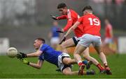 5 January 2019; Conor Shields of Longford in action against Ciarán Downey and John Clutterbuck, right, of Louth during the Bord na Móna O'Byrne Cup Round 3 match between Longford and Louth at Glennon Brothers Pearse Park in Longford. Photo by Piaras Ó Mídheach/Sportsfile