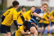 17 January 2019; Matthew Jungmann of Newpark Comprehensive is tackled by Craig Adams of The Kings Hospital during the Bank of Ireland Vinnie Murray Cup Round 2 match between The Kings Hospital and Newpark Comprehensive at Energia Park in Dublin. Photo by Eóin Noonan/Sportsfile