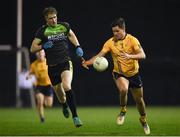 18 January 2019; Brendan McCole of DCU Dóchas Éireann in action against Nick Doyle of IT Carlow during the Electric Ireland Sigerson Cup Round 1 match between DCU Dóchas Éireann and IT Carlow at Dublin City University Sportsgrounds in Dublin. Photo by Harry Murphy/Sportsfile
