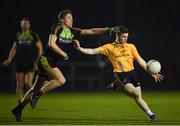 18 January 2019; David Garland of DCU Dóchas Éireann in action against Eoin Buggie of IT Carlow during the Electric Ireland Sigerson Cup Round 1 match between DCU Dóchas Éireann and IT Carlow at Dublin City University Sportsgrounds in Dublin. Photo by Harry Murphy/Sportsfile