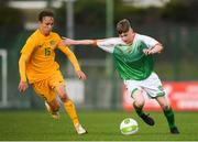 19 January 2019; Ross Tierney of Republic of Ireland in action against Jake Hollman of Australia during a U18 Schools International friendly match between Republic of Ireland and Australia at Whitehall Stadium in Dublin. Photo by Eóin Noonan/Sportsfile