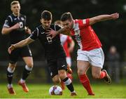 19 January 2019; Brandon Miele of St Patrick's Athletic in action against Kevin Taylor of Cobh Ramblers during a pre-season friendly match between St. Patrick’s Athletic and Cobh Ramblers at Ballyoulster United in Kildare. Photo by Harry Murphy/Sportsfile