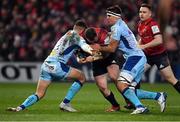 19 January 2019; Dave Kilcoyne of Munster is tackled by Henry Slade, left, and Sam Skinner of Exeter Chiefs during the Heineken Champions Cup Pool 2 Round 6 match between Munster and Exeter Chiefs at Thomond Park in Limerick. Photo by Brendan Moran/Sportsfile