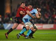 19 January 2019; Dave Dennis of Exeter Chiefs is tackled by Tommy O’Donnell and Dave Kilcoyne of Munster during the Heineken Champions Cup Pool 2 Round 6 match between Munster and Exeter Chiefs at Thomond Park in Limerick. Photo by Diarmuid Greene/Sportsfile