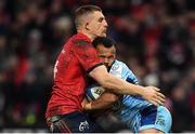 19 January 2019; Tom O'Flaherty of Exeter Chiefs is tackled by Andrew Conway of Munster during the Heineken Champions Cup Pool 2 Round 6 match between Munster and Exeter Chiefs at Thomond Park in Limerick. Photo by Brendan Moran/Sportsfile