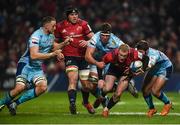 19 January 2019; Keith Earls of Munster is tackled by Jonny Hill, Sam Skinner and Santiago Cordero of Exeter Chiefs during the Heineken Champions Cup Pool 2 Round 6 match between Munster and Exeter Chiefs at Thomond Park in Limerick. Photo by Diarmuid Greene/Sportsfile