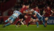 19 January 2019; Conor Murray of Munster is tackled by Dave Dennis, left, and Jack Yeandle of Exeter Chiefs during the Heineken Champions Cup Pool 2 Round 6 match between Munster and Exeter Chiefs at Thomond Park in Limerick. Photo by Diarmuid Greene/Sportsfile