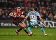 19 January 2019; Joey Carbery of Munster in action against Joe Simmonds of Exeter Chiefs during the Heineken Champions Cup Pool 2 Round 6 match between Munster and Exeter Chiefs at Thomond Park in Limerick. Photo by Diarmuid Greene/Sportsfile