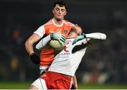 19 January 2019; Declan McClure of Tyrone is high tackled by Connaire Mackin of Armagh during the Bank of Ireland Dr McKenna Cup Final match between Armagh and Tyrone at the Athletic Grounds in Armagh. Photo by Oliver McVeigh/Sportsfile