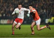 19 January 2019; Declan McClure of Tyrone in action against Niall Grimley of Armagh during the Bank of Ireland Dr McKenna Cup Final match between Armagh and Tyrone at the Athletic Grounds in Armagh. Photo by Oliver McVeigh/Sportsfile