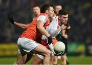 19 January 2019; Declan McClure of Tyrone in action against Brendan Donaghy of Armagh during the Bank of Ireland Dr McKenna Cup Final match between Armagh and Tyrone at the Athletic Grounds in Armagh. Photo by Oliver McVeigh/Sportsfile