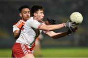19 January 2019; Conal McCann of Tyrone in action against Jemar Hall of Armagh during the Bank of Ireland Dr McKenna Cup Final match between Armagh and Tyrone at the Athletic Grounds in Armagh. Photo by Oliver McVeigh/Sportsfile