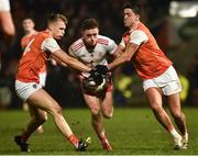 19 January 2019; Liam Rafferty of Tyrone in action against Rian O'Neill, left, and Stefan Campbell of Armagh during the Bank of Ireland Dr McKenna Cup Final match between Armagh and Tyrone at the Athletic Grounds in Armagh. Photo by Oliver McVeigh/Sportsfile