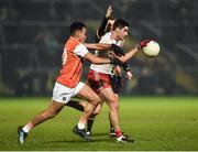 19 January 2019; Michael Cassidy of Tyrone in action against Jemar Hall of Armagh during the Bank of Ireland Dr McKenna Cup Final match between Armagh and Tyrone at the Athletic Grounds in Armagh. Photo by Oliver McVeigh/Sportsfile