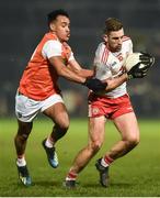 19 January 2019; Niall Sludden of Tyrone in action against Jemar Hall of Armagh during the Bank of Ireland Dr McKenna Cup Final match between Armagh and Tyrone at the Athletic Grounds in Armagh. Photo by Oliver McVeigh/Sportsfile
