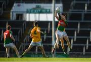 20 January 2019; Kevin Gorman of Kilcummin in action against Peter Kelly of Two Mile House during the AIB GAA Football All-Ireland Intermediate Championship semi-final match between Two Mile House and Kilcummin at the Gaelic Grounds in Limerick. Photo by Eóin Noonan/Sportsfile