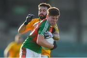 20 January 2019; Pádraig Nagle of Kilcummin is tackled by Aidan Casey of Two Mile House during the AIB GAA Football All-Ireland Intermediate Championship semi-final match between Two Mile House and Kilcummin at the Gaelic Grounds in Limerick. Photo by Eóin Noonan/Sportsfile