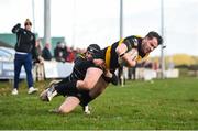 20 January 2019; Jeff McDermott of Co Carlow RFC goes over to score his side's first try despite the attempted tackle from Liam Caddy of Kilkenny RFC the Bank of Ireland Provincial Towns Cup Round 1 match between Co Carlow RFC and Kilkenny RFC at Carlow RFC in Oakpark, Carlow. Photo by David Fitzgerald/Sportsfile