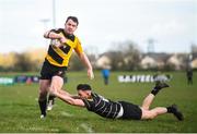 20 January 2019; Jeff McDermott of Co Carlow RFC evades the attempted tckle from Lyndon Brannigan of Kilkenny RFC on his way to scoring his side's first try during the Bank of Ireland Provincial Towns Cup Round 1 match between Carlow RFC and Kilkenny RFC at Co Carlow RFC in Oakpark, Carlow. Photo by David Fitzgerald/Sportsfile
