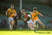 20 January 2019; Gary O'Leary of Kilcummin is tackled by Conor Keogh of Two Mile House during the AIB GAA Football All-Ireland Intermediate Championship semi-final match between Two Mile House and Kilcummin at the Gaelic Grounds in Limerick. Photo by Eóin Noonan/Sportsfile