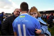 28 October 2018; Eddie Brennan of Graigue Ballycallan speaks with Former Uachtarán Chumann Lúthchleas Gael Nickey Brennan while holding his daughter Maeve following the Kilkenny County Intermediate Club Hurling Championship Final between Graigue Ballycallan and Tullaroan at Nowlan Park in Kilkenny. Photo by Stephen McCarthy/Sportsfile