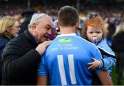 28 October 2018; Eddie Brennan of Graigue Ballycallan speaks with Former Uachtarán Chumann Lúthchleas Gael Nickey Brennan while holding his daughter Maeve following the Kilkenny County Intermediate Club Hurling Championship Final between Graigue Ballycallan and Tullaroan at Nowlan Park in Kilkenny. Photo by Stephen McCarthy/Sportsfile