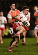 19 January 2019; Liam Rafferty of Tyrone in action against Stefan Campbell of Armagh during the Bank of Ireland Dr McKenna Cup Final match between Armagh and Tyrone at the Athletic Grounds in Armagh. Photo by Oliver McVeigh/Sportsfile