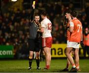 19 January 2019; Referee Joe McQuillan issues a yellow card to Conal McCann of Tyrone during the Bank of Ireland Dr McKenna Cup Final match between Armagh and Tyrone at the Athletic Grounds in Armagh. Photo by Oliver McVeigh/Sportsfile