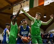 21 January 2019; Aonghus McDonnell of St Joseph's Bish, Galway, in action against Roniel Oguekwe, left, and Oisin Holland of Calasanctius College, Oranmore, during the Subway All-Ireland Schools Cup U16 A Boys Final match between Calasantius College and St Joseph's Bish Galway at the National Basketball Arena in Tallaght, Dublin. Photo by David Fitzgerald/Sportsfile