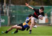 21 January 2019; Jonathan Lees of The High School is tackled by Eoin Clarke of CBS Naas during the Bank of Ireland Fr. Godfrey Cup 2nd Round match between The High School and CBS Naas at Energia Park in Dublin. Photo by Sam Barnes/Sportsfile