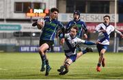 21 January 2019; Pepe Papen of Gorey Community School evades the tackle of Maurice Simington of St Andrew's College during the Bank of Ireland Fr. Godfrey Cup 2nd Round match between St Andrews College and Gorey Community School at Energia Park in Dublin. Photo by Sam Barnes/Sportsfile