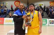 22 January 2019; Colaiste na Coiribe captain Nicky Ó Laighléis is presented with the cup by Matthew Hall of Basketball Ireland after the Subway All-Ireland Schools Cup U19 B Boys Final match between Colaiste na Coiribe and Colaiste Pobail Beanntrai at the National Basketball Arena in Tallaght, Dublin. Photo by Brendan Moran/Sportsfile